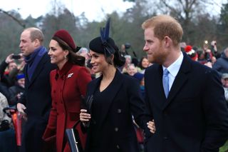 Prince William, Duke of Cambridge, Catherine, Duchess of Cambridge, Meghan, Duchess of Sussex and Prince Harry, Duke of Sussex leave after attending Christmas Day Church service