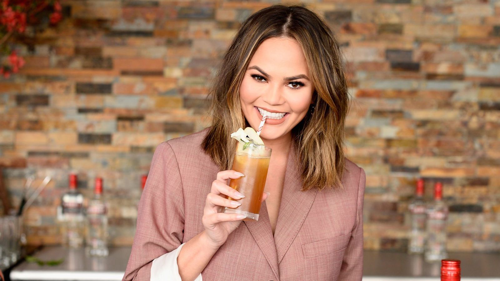 Chrissy Teigen Drinking While Exercising on Instagram Is My Mood ...