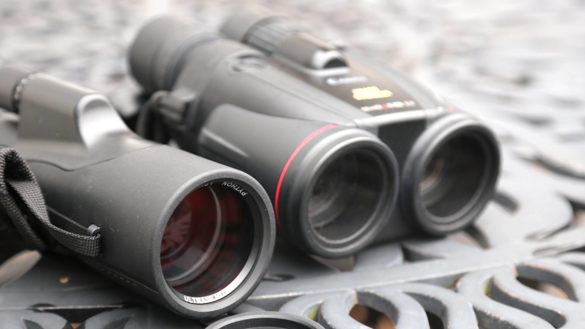 Binoculars next to a monocular