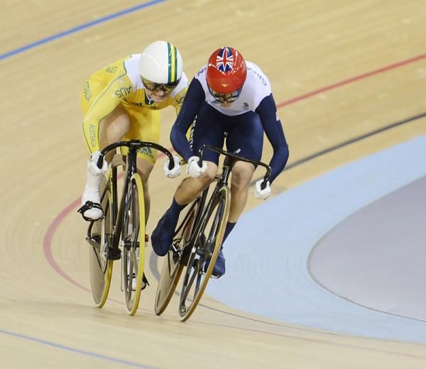Anna Meares and Victoria Pendleton throw elbows. Pendleton comes out of the sprint lane,a move that gets her relegated.