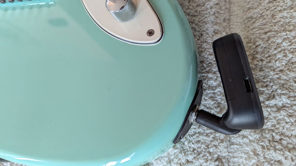 Closeup of Xvive A58 wireless system plugged into jack