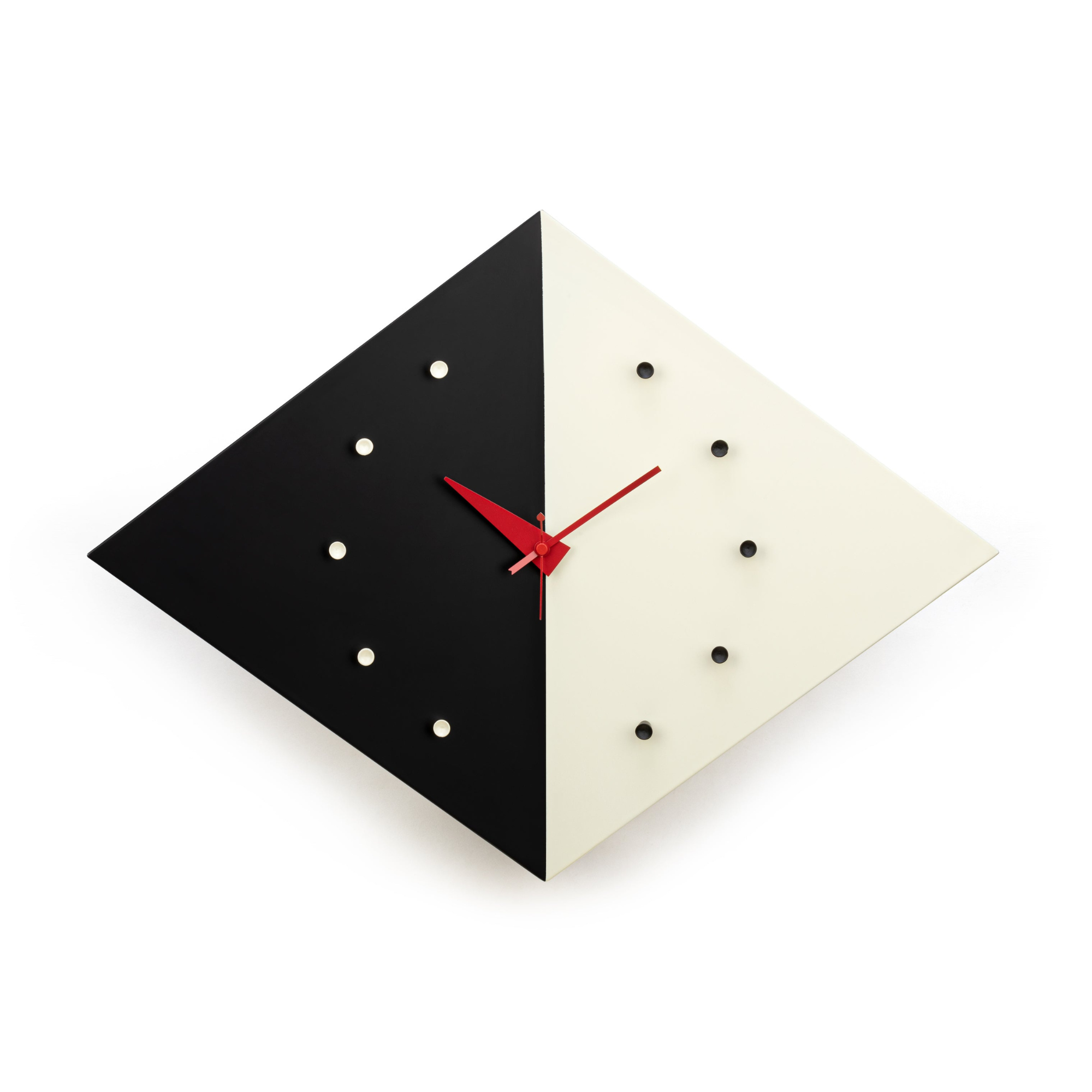 black and white contrasting clock with red hands