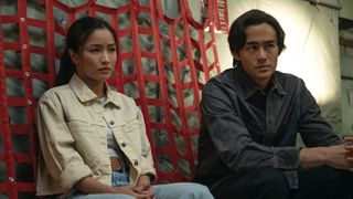 Cate and Kentaro sitting in a cargo plan in Monarch: Legacy of Monsters season 2 episode 5