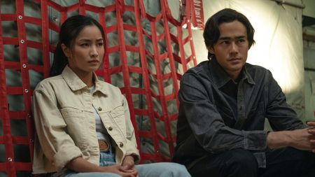 Cate and Kentaro sitting in a cargo plan in Monarch: Legacy of Monsters season 2 episode 5