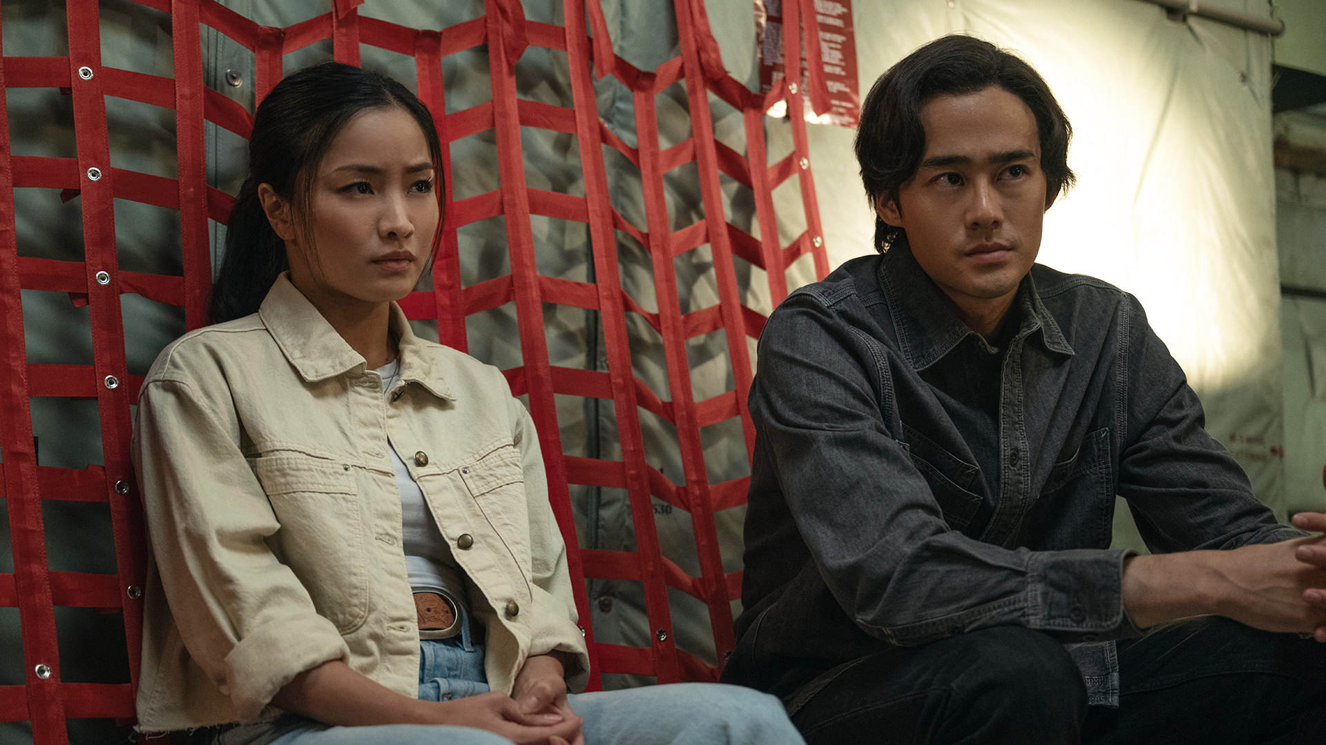 Cate and Kentaro sitting in a cargo plan in Monarch: Legacy of Monsters season 2 episode 5