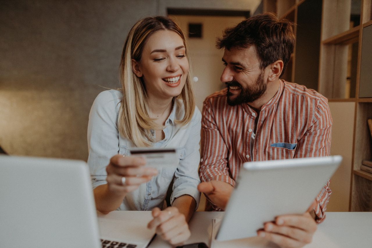 Young couple check credit score