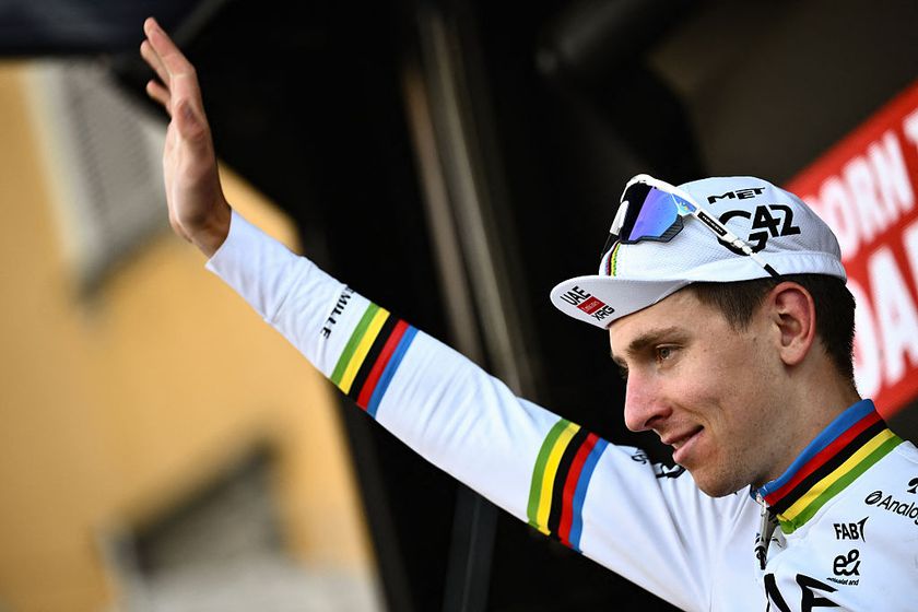 UAE Team Emirates’s Slovenian rider Tadej Pogacar celebrates his victory on the podium after the 119th edition of the Giro di Lombardia (Tour of Lombardy), a 238km cycling race from Como to Bergamo on October 11, 2025. (Photo by Marco BERTORELLO / AFP)