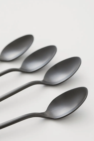four black matte teaspoons