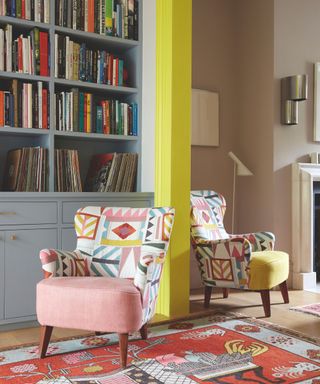 corner of living room with armchair and rug