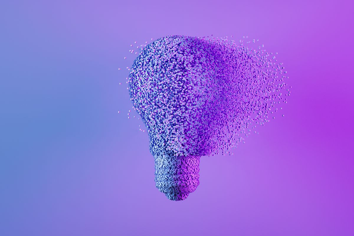 An abstract render of a lightbulb slowly dissolving on a blue and purple background