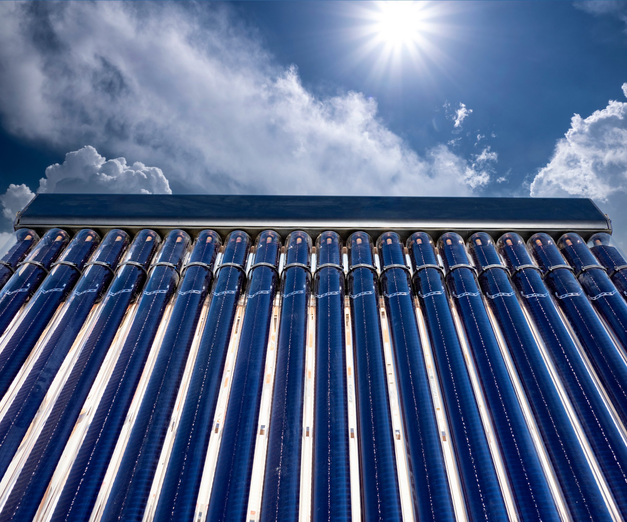 Solar thermal panels with a blue sunny sky in the background