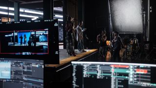 AI filmmaking; monitors show a film's editing live on set