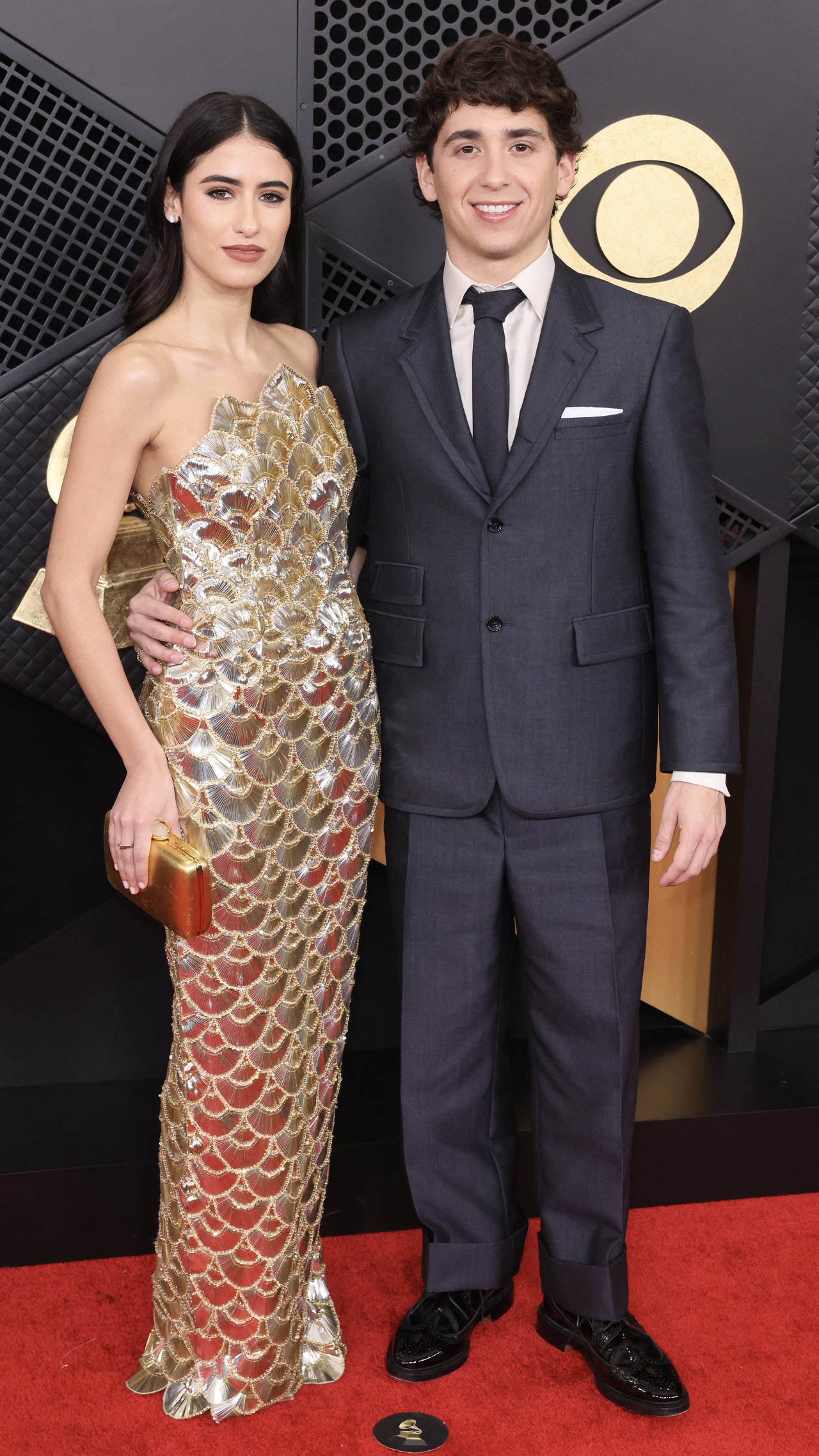 Ana Amelia Batlle Cabral and US comedian actor Marcello Hernandez arrive for the 68th Annual Grammy Awards at the Crypto.com Arena in Los Angeles on February 1, 2026.