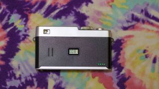 The Camp Snap CS-Pro on a colorful background