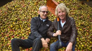 Francis Rossi and Rick Parfitt harvesting apples for their cider