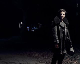 Dror For Tumi Trieste - man in leather jacket alone at night