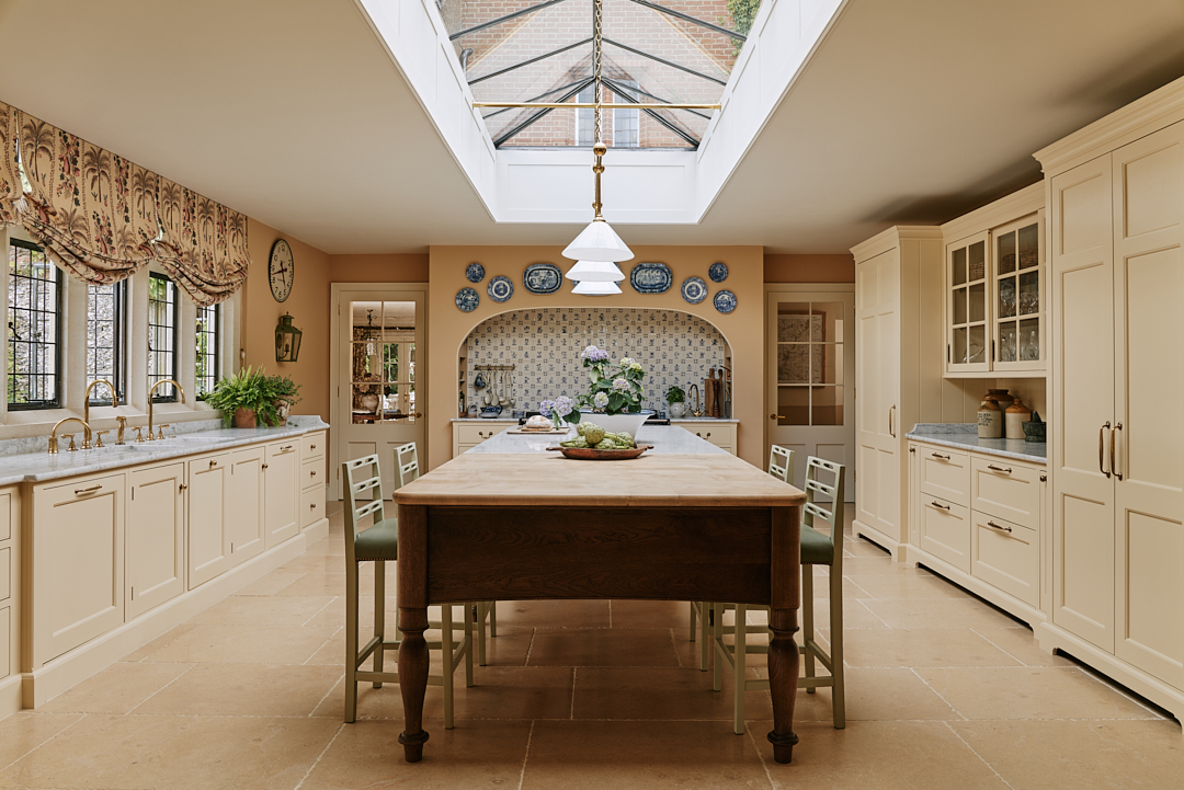 The traditional english country house interiors designed by Salvesen Graham. Lots of soft hues, rugs, and an eclectic style