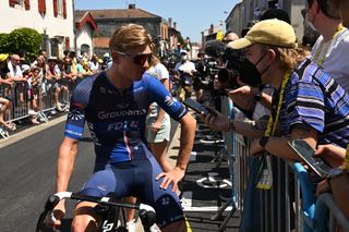 Lars van den Berg speaks to journalists at the 2023 Tour de France