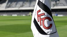 Fulham FC logo on a corner flag inside Craven Cottage