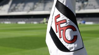 Fulham FC logo on a corner flag inside Craven Cottage