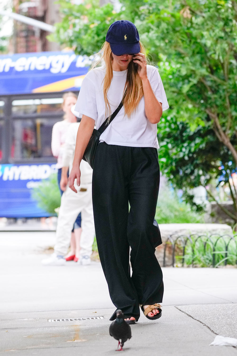 Celebrity baseball hat outfit.