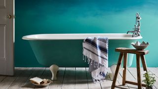 A turquoise bathroom illustrating paint color ideas for bathrooms