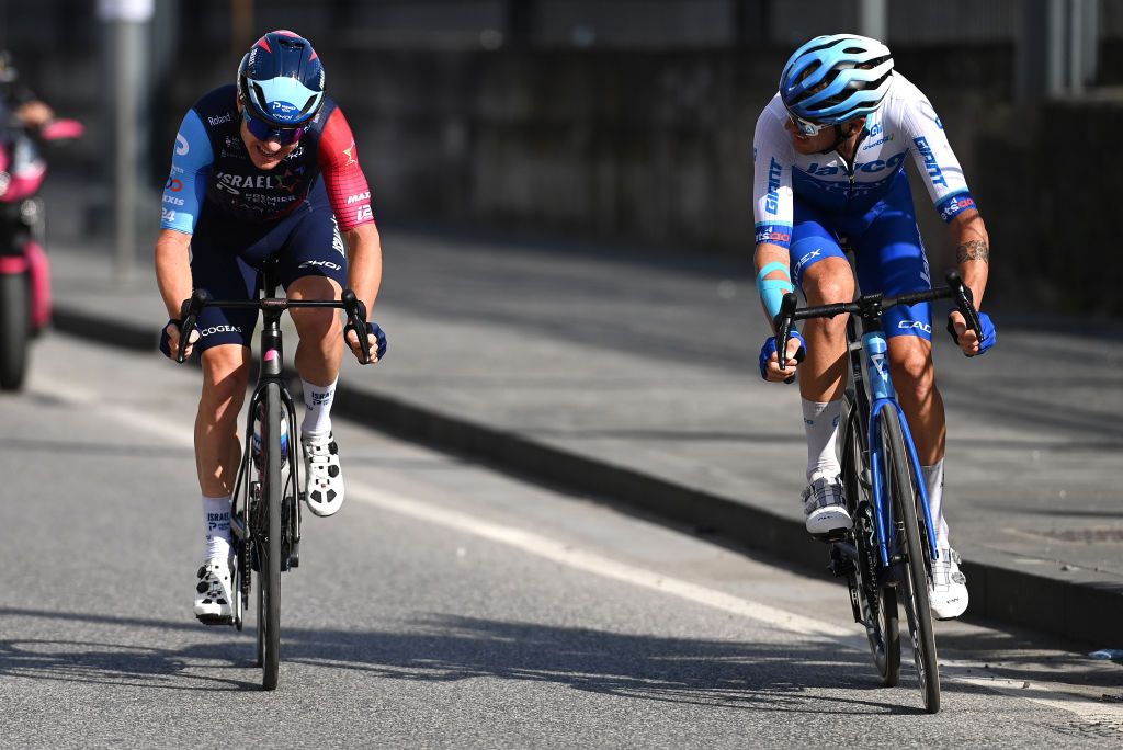 NAPLES ITALY MAY 11 Simon Clarke of Australia and Team Israel Premier Tech and Alessandro De Marchi of Italy and Team Jayco AlUla compete in the breakaway passing through Naples ity while fans cheer during the 106th Giro dItalia 2023 Stage 6 a 162km stage from Naples to Naples UCIWT on May 11 2023 in Naples Italy Photo by Tim de WaeleGetty Images