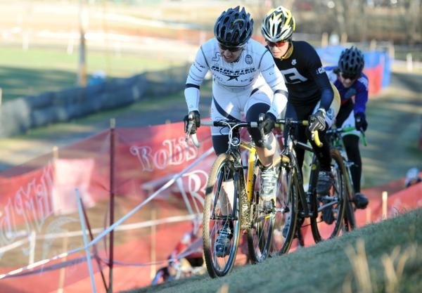Laura Van Gilder (C3/Athletes Serving Athletes) leads on an off-camber.