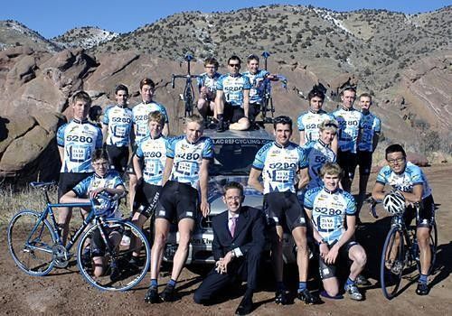 The team with a dapper-looking Jon Vaughters.
