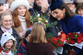 SANDRINGHAM, NORFOLK - DECEMBER 25: Catherine, Princess of Wales and Mia Tindall greet well-wishers after attending the Christmas Morning Service at Sandringham Church on December 25, 2023 in Sandringham, Norfolk. (Photo by Stephen Pond/Getty Images)