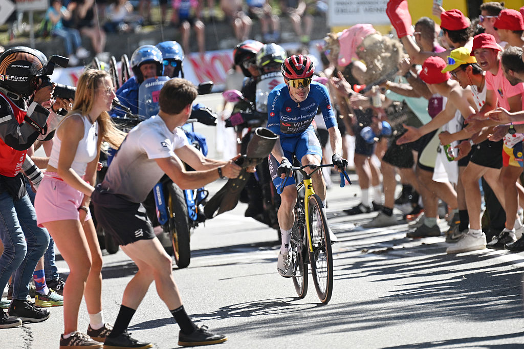 PILA - GRESSAN, ITALY - MAY 23: Stage winner Jonas Vingegaard of Denmark and Team Visma | Lease a Bike - Blue Mountain Jersey attacks in the breakaway while fans cheer during the 109th Giro d&amp;apos;Italia 2026, Stage 14 a 133km stage from Aosta to Pila - Gressan 1789m / #UCIWT / on May 23, 2026 in Pila - Gressan, Italy. (Photo by Tim de Waele/Getty Images)