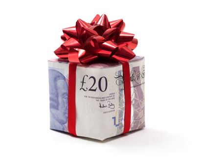 Boxed present wrapped with cash