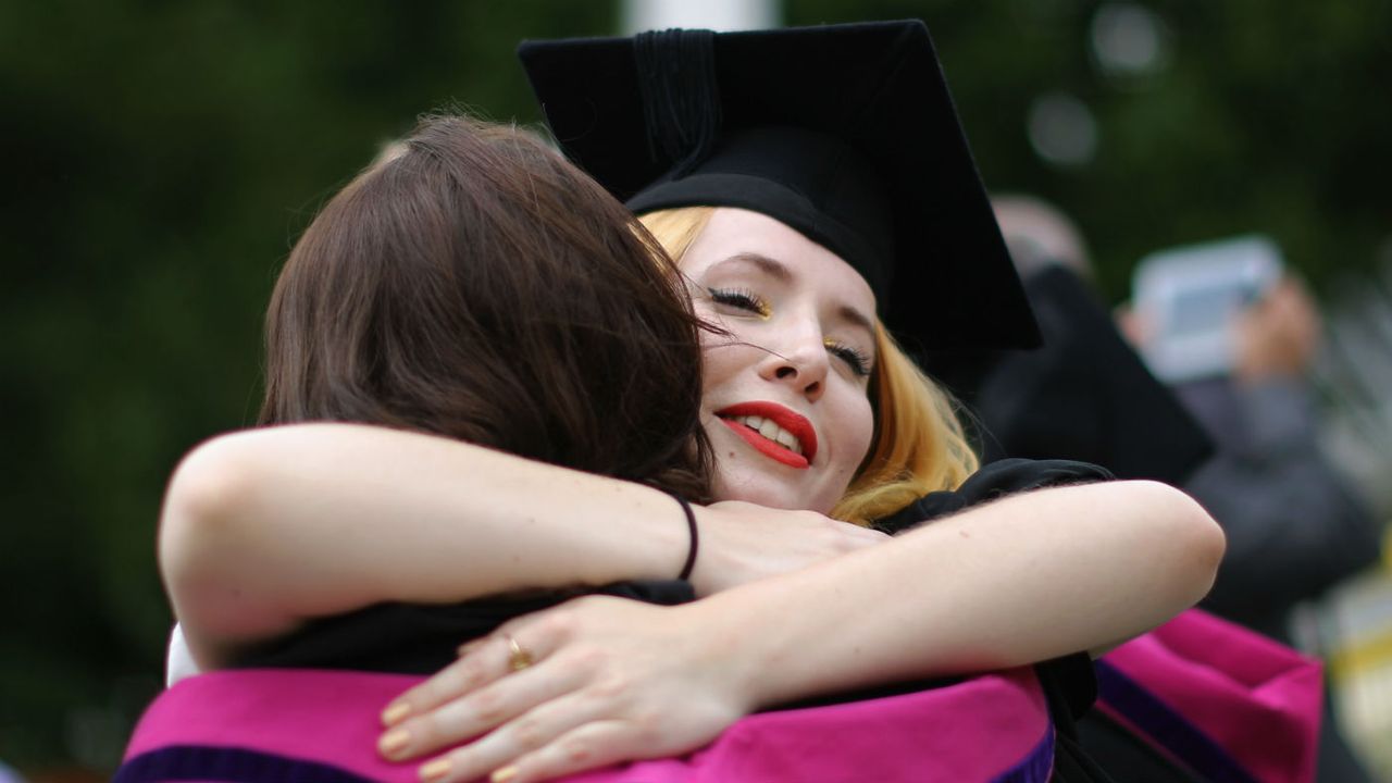 Two women hugging 