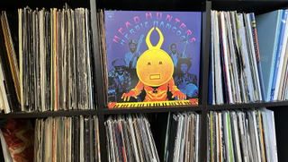 Herbie Hancock vinyl record showcased against vinyl storage