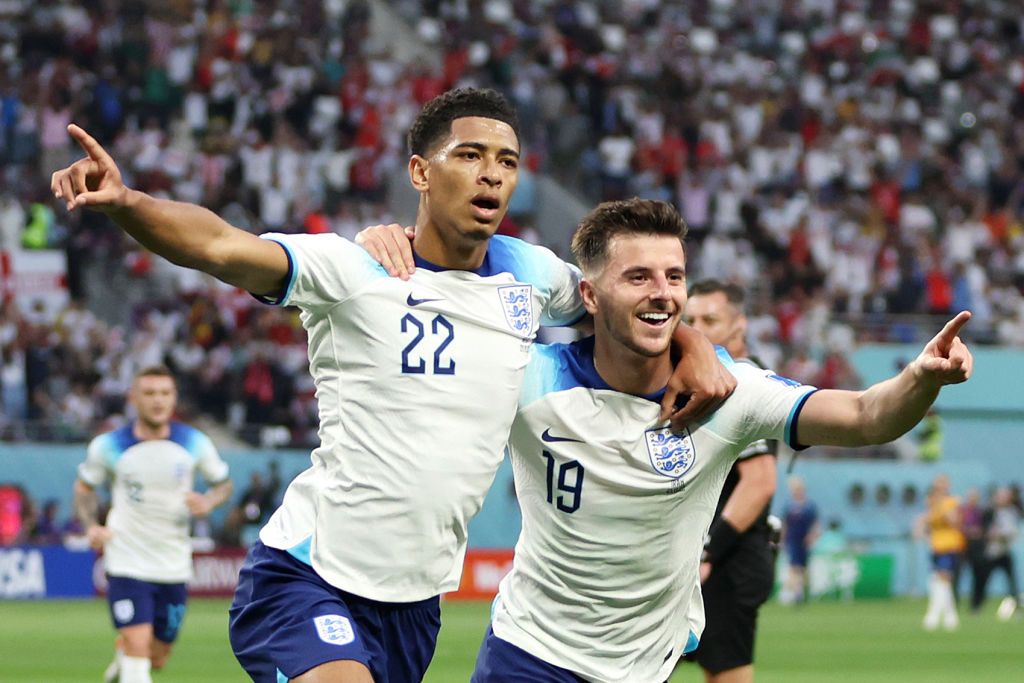 WATCH: Jude Bellingham scores England&#039;s opening goal at World Cup 2022: Jude Bellingham of England celebrates with Mason Mount after scoring their team&#039;s first goal during the FIFA World Cup Qatar 2022 Group B match between England and IR Iran at Khalifa International Stadium on November 21, 2022 in Doha, Qatar.