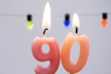 Number 90 lit candles