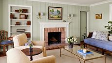 traditional living room with light green walls