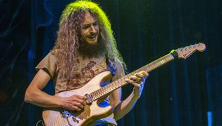 Guthrie Govan performs onstage with the Aristocrats at the Assembly in Leamington Spa, United Kingdom on February 19, 2014