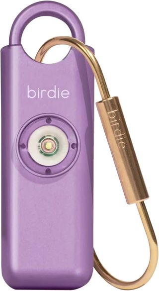 Light purple Birdie personal alarm with brass bag clip