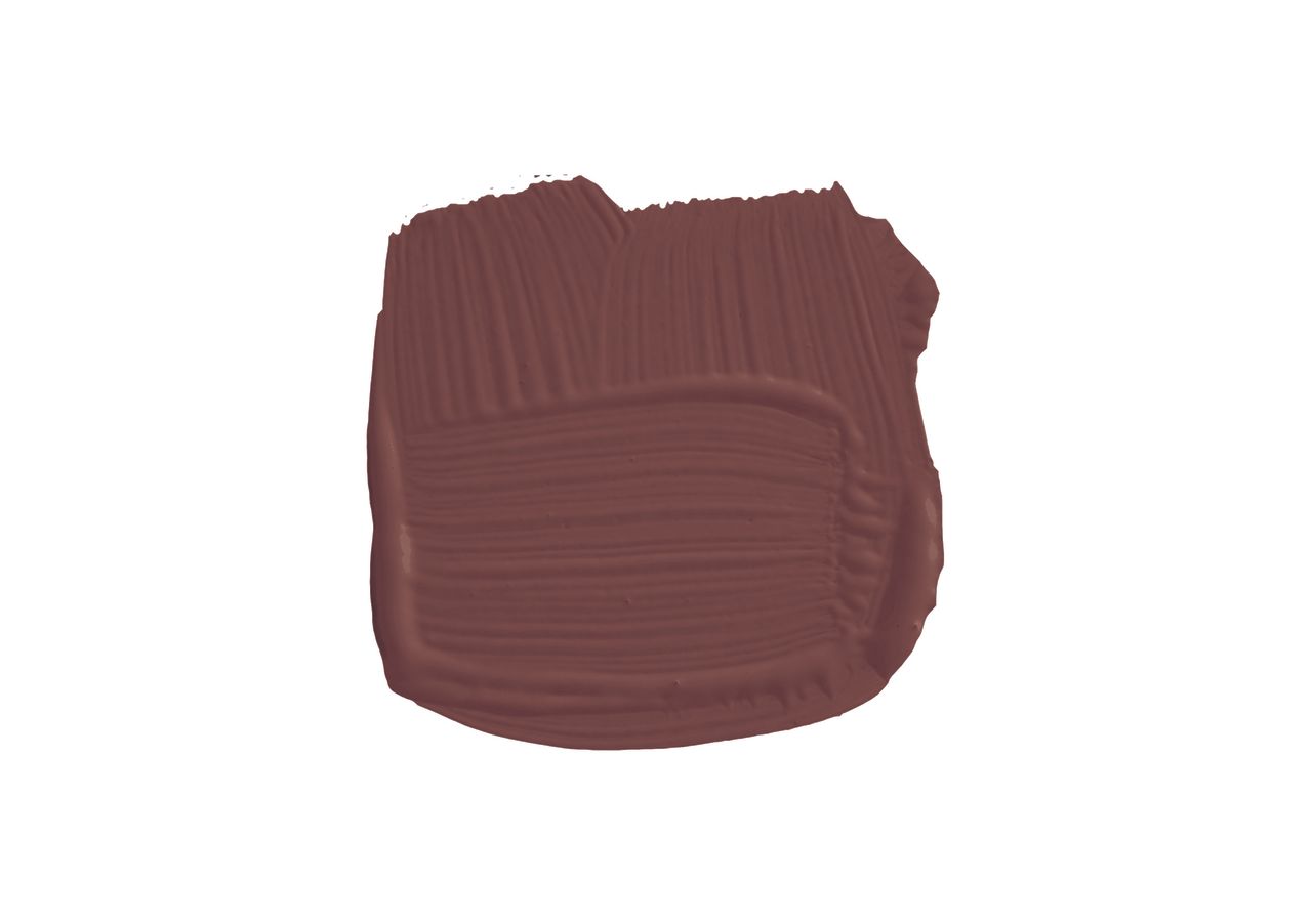 Swatch of a deep brick red paint color
