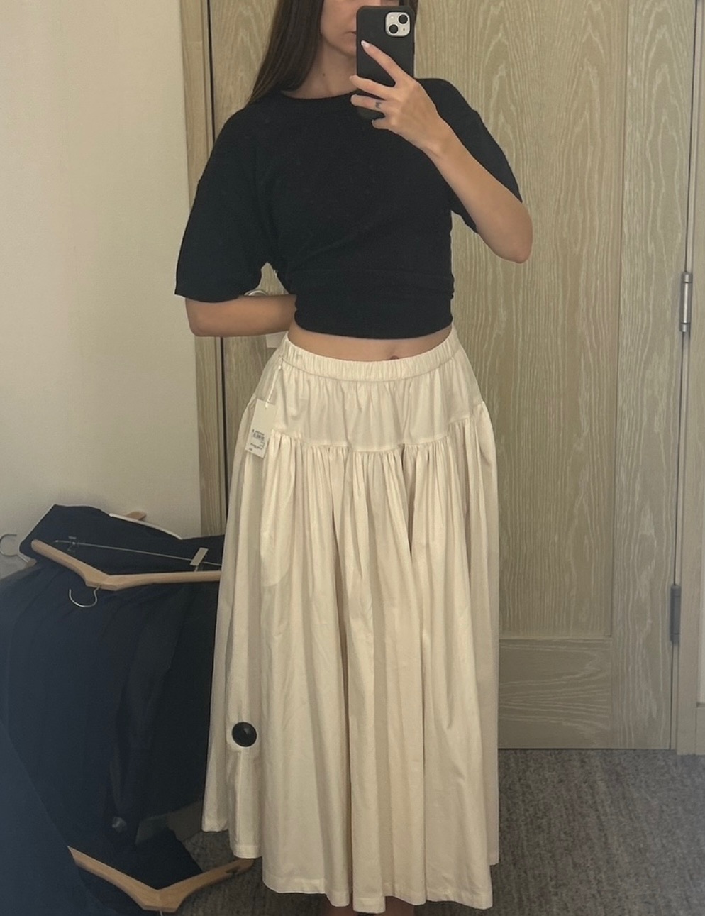 Audry Hiaoui trying on clothes atReplica Store flagship during theReplica Store Anniversary Sale 2025.