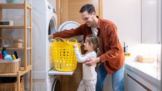 Family enjoying ease of use with stackable washer dryer