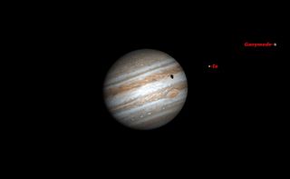 At 11:48 p.m., Io’s faster moving shadow catches up with Ganymede’s, and the two shadows merge. Again, the Great Red Spot is well placed.
