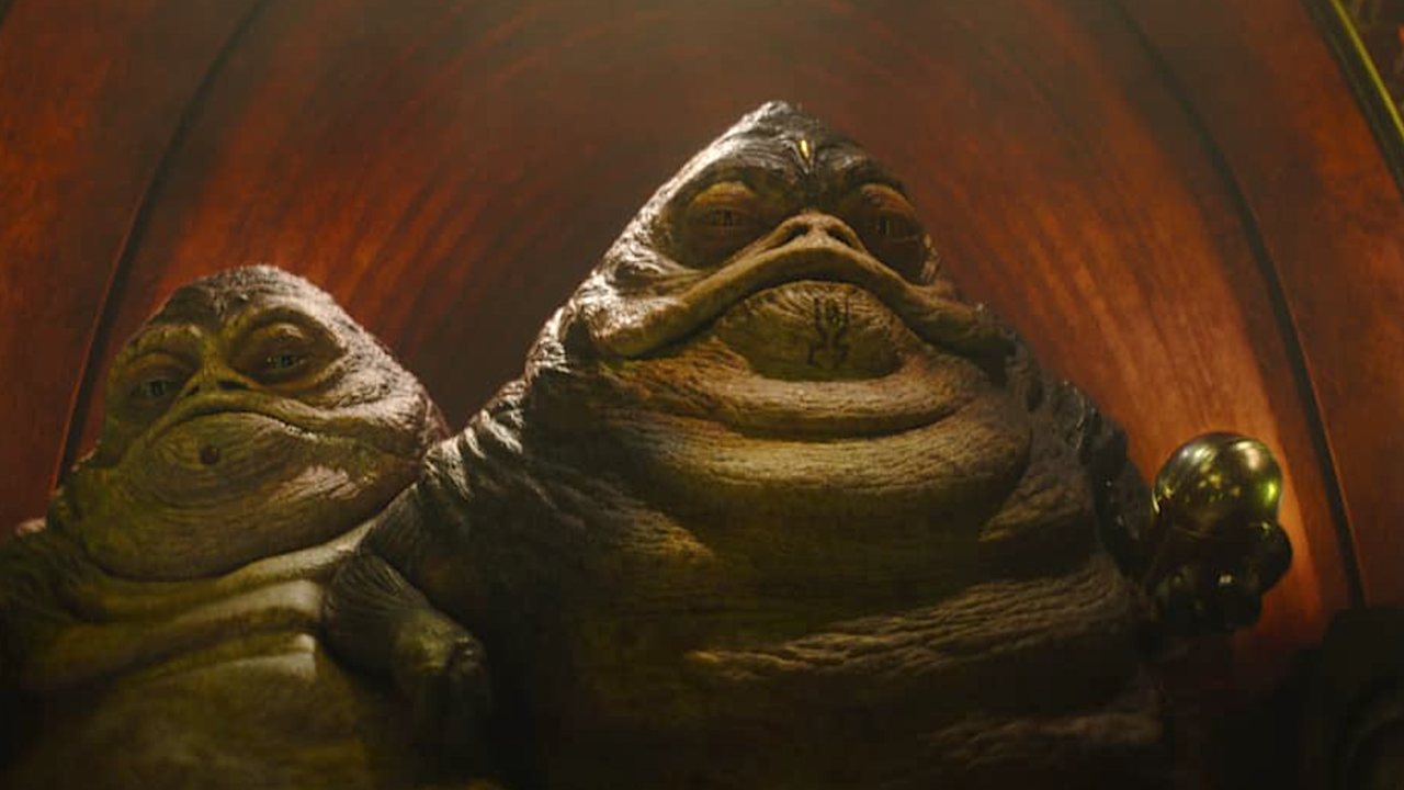 two huge alien slugs from a sci-fi movie