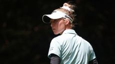 Nelly Korda of the United States reacts to her fairway shot on the first hole during Day Two of the KPMG Women's PGA Championship at Sahalee Country Club in Sammamish, Washington, USA, on Friday, June 21, 2024.