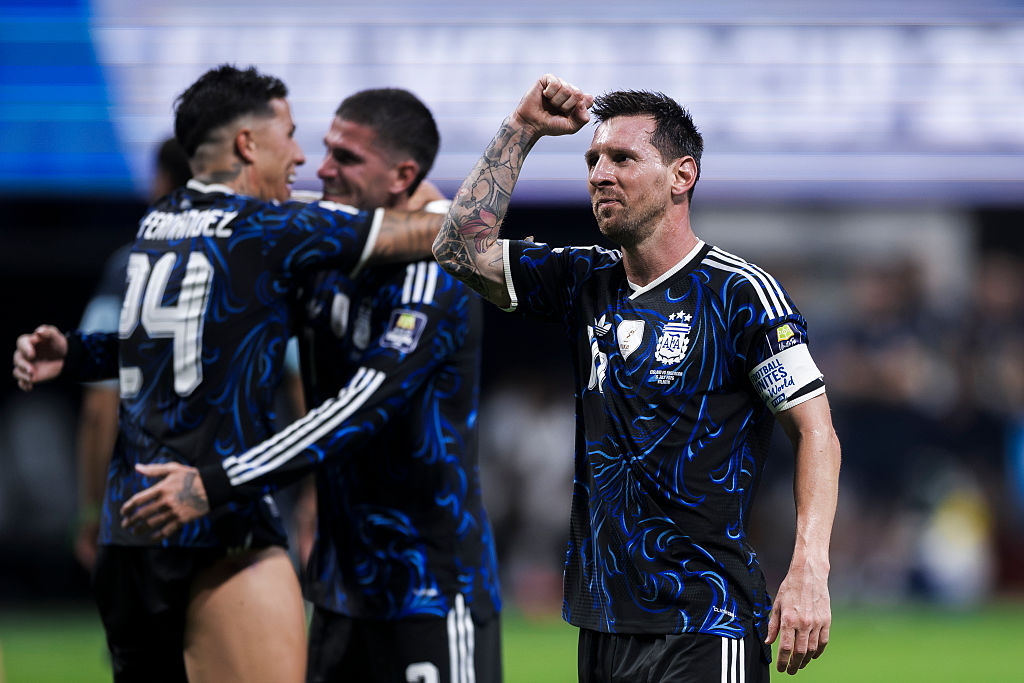 Lionel Messi salutes the fans after Argentina's semi-final victory over England