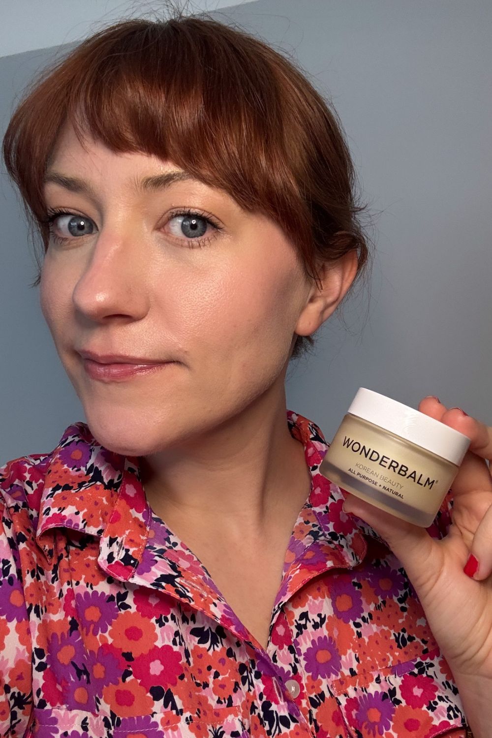 matilda holding a tub of wonderbalm