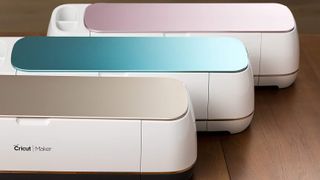 Three Cricut Makers in different colours