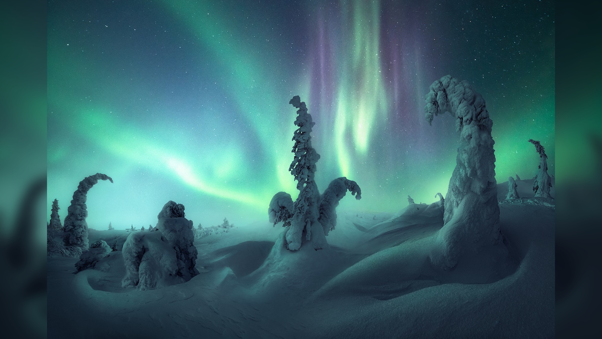 A photo of the northern lights, part of the travel photography blog Capture the Atlas 2022 Northern Lights Photographer of the Year collection. This image was taken by Nico Rinaldi.