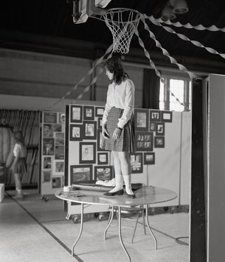 black and white images of girls in school uniform